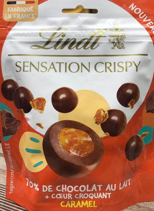 Lindt Sensation Crispy 70% Of Milk Chocolate with a crunchy & caramel Shots 140g